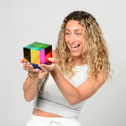 The Original CMY Cube held up to the light, colours overlapping