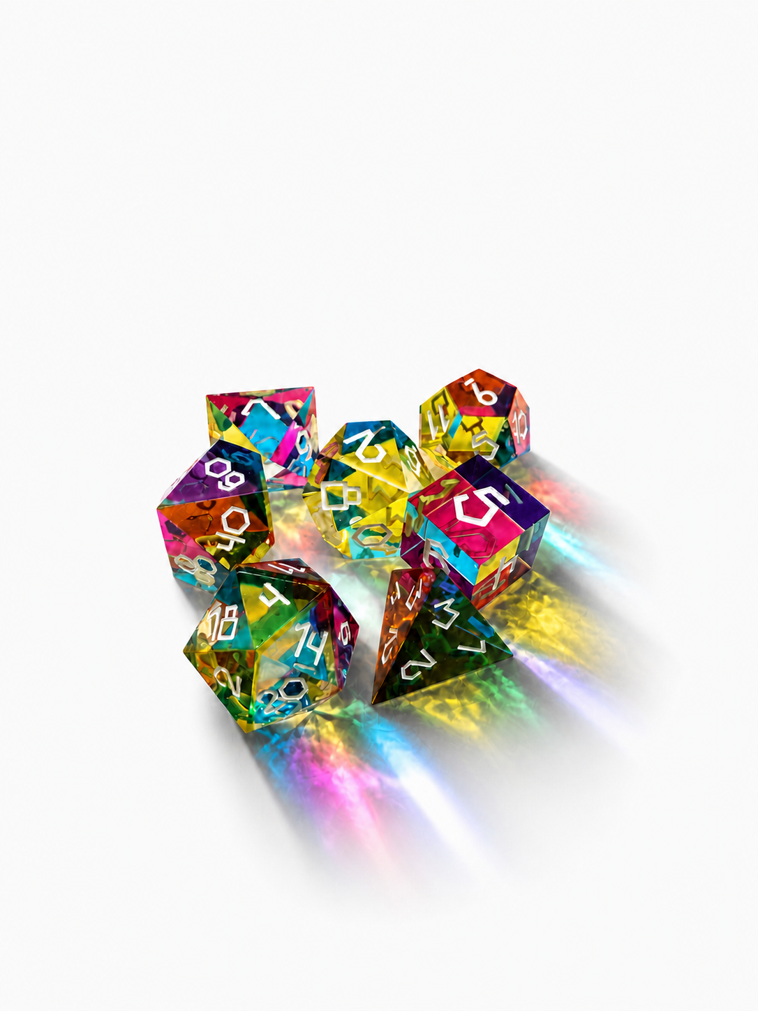 Seven CMY Cubes colour mixing dice scattered on white, throwing rainbow light
